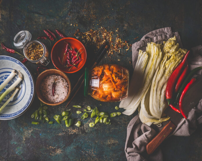 Fermented,Food,And,Preserving,Concept.,Glass,With,Kimchi,Cabbage,In
