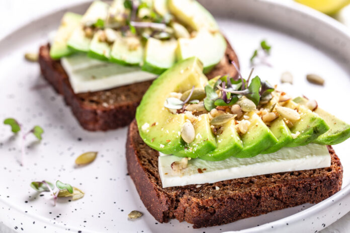 Healthy,Avocado,Toasts,With,Rye,Bread,,Sliced,Avocado,,Cheese,,Pumpkin,